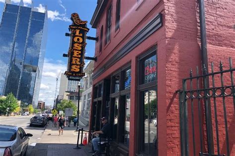 Losers bar nashville - August 4, 2022 · 1 min read. A crowd gathers outside after the Hardy and Ernest’s Hixtape Party at Losers was delayed in Nashville , Tenn., Wednesday, Aug. 3, 2022. Losers Bar and Grill was ...